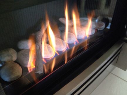 Burning stones in a gas fireplace.