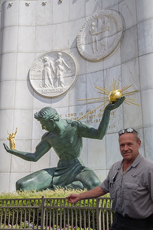 Doc stopping for a photo opp with the Spirit of Detroit